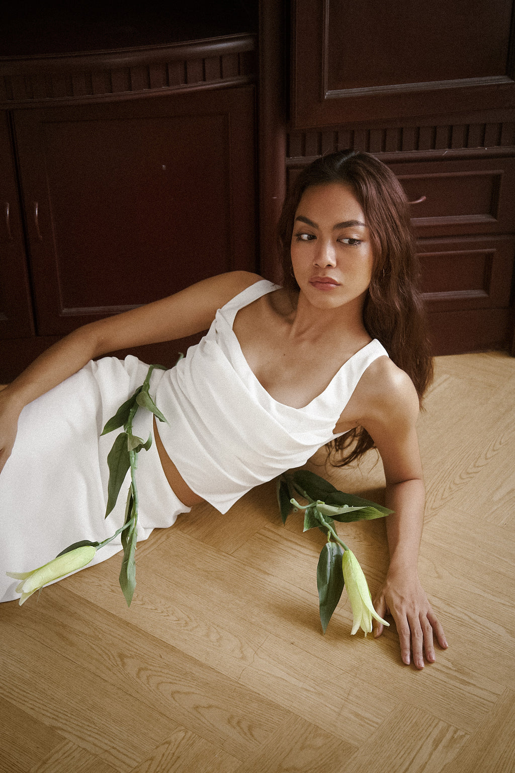 woman in white pearl nathanie odeon top.